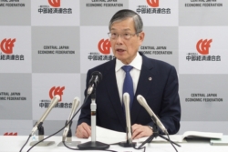 「中部圏ビジョン２０５０」を公表する水野会長（中央、３日、名古屋市）